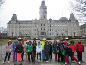 4th and 5th grader in front of the parliament building in Quebec, Canada