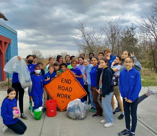 French American Academy students participating in Earth Day in engaging in trail maintenance and beach cleanup.
